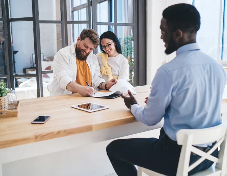 couple meeting with loan officer