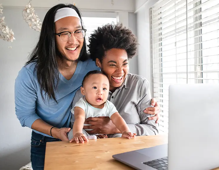 family doing reseach on the computer