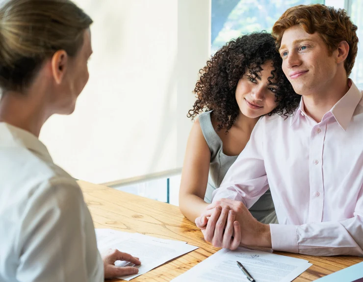 couple meeting with loan officer
