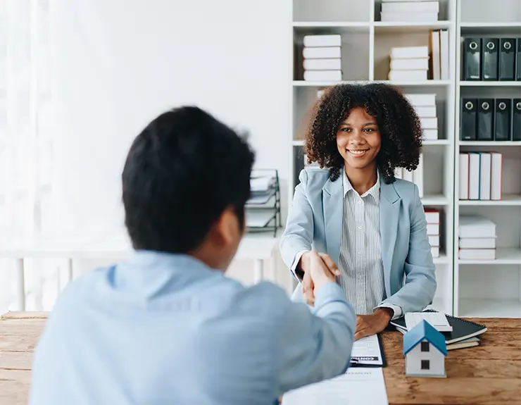 woman working with a loan officer