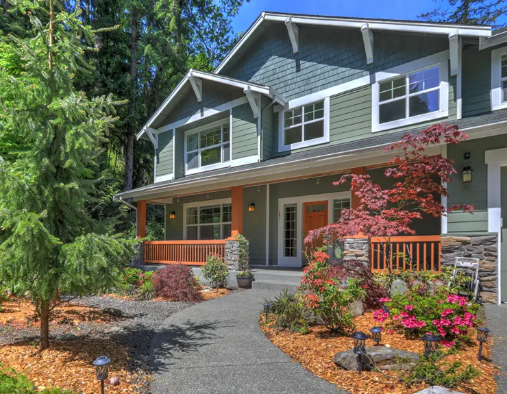 home buyer researching homes on laptop