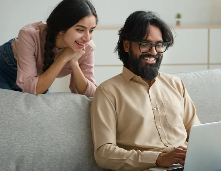 couple doing research on the computer