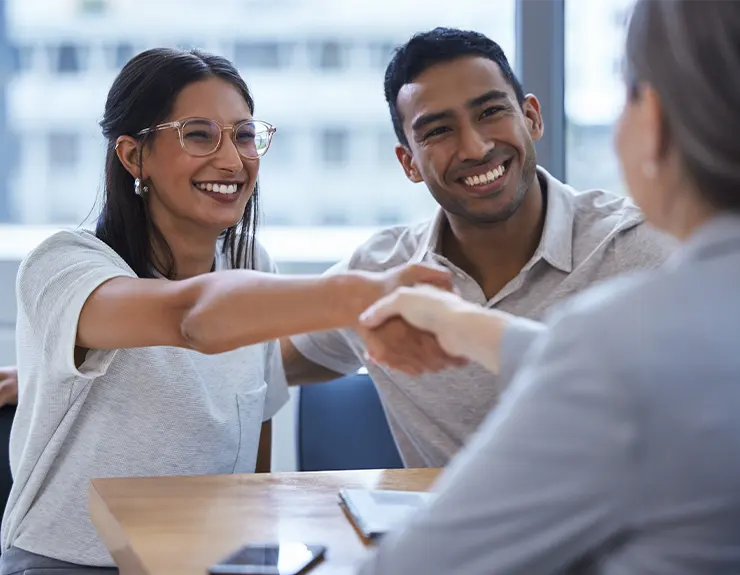 couple working with loan officer