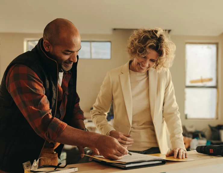 two people discussing home improvement plans