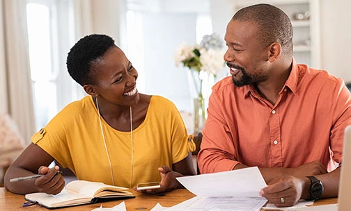 Mature couple managing home finance