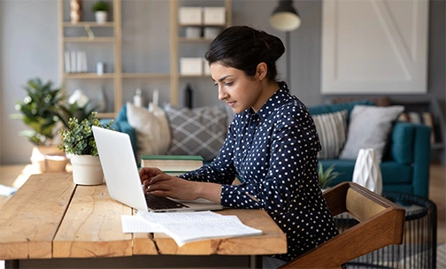 Woman doing research on her computer