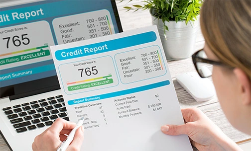 woman reviewing credit report