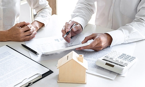 loan officer explaining paperwork