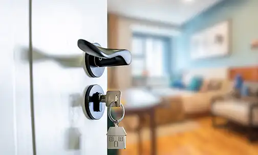 key opening door to new home