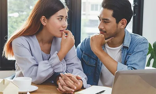 couple looking at computer