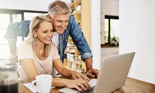 Couple looking at the computer screen