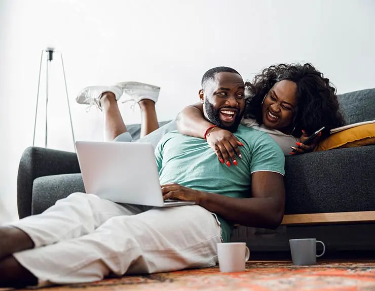 couple doing research on the computer