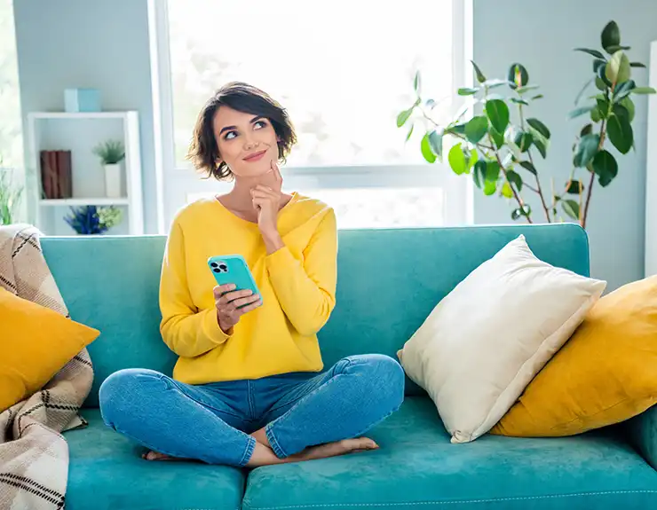 happy woman on her couch